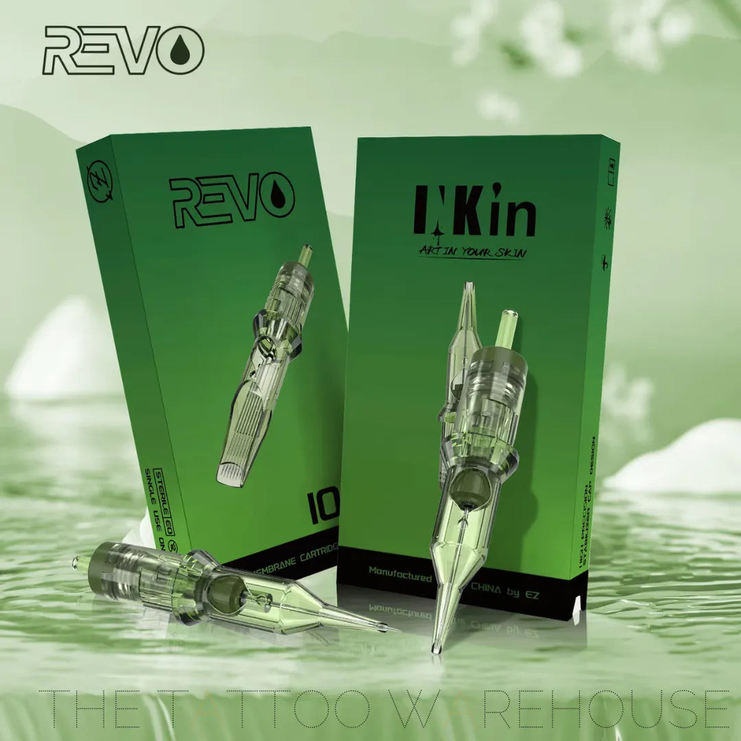 Close up of the INKin Revo cartridges with their green boxes in the back ground. Beautiful green cartridges from The Tattoo Warehouse.