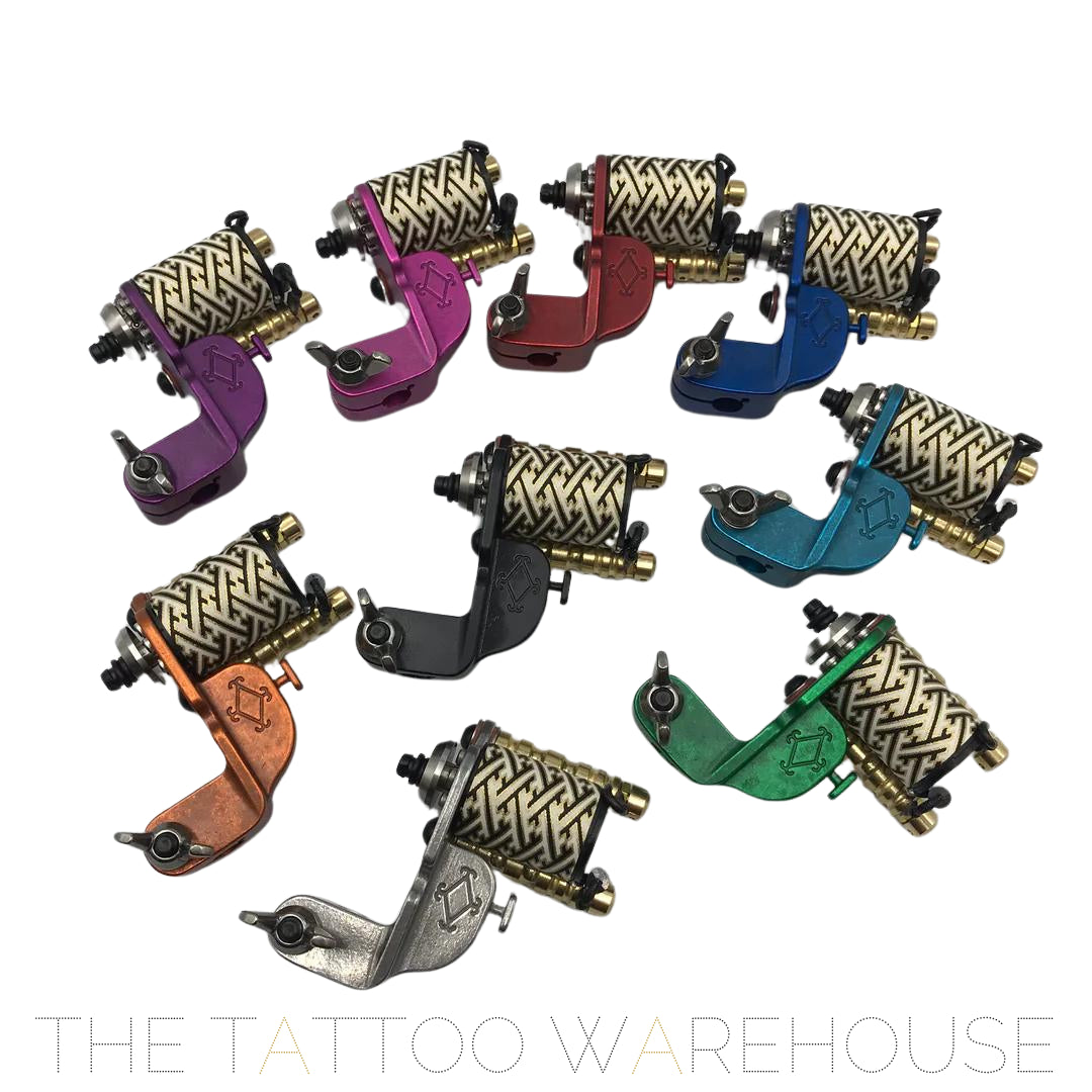 A Beautiful closeup of all the different colored Era Higa Quinke V1. The MAXXON motor has a geometric pattern originating from Japan. Such beautiful looking rotary tattoo machines