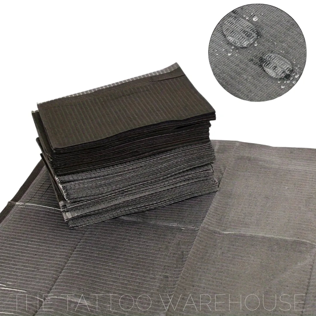Black dental bib tray liners, stacked pack