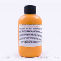 Bottle of Dermaglo Golden Yellow tattoo ink