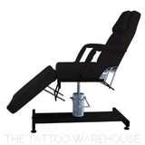 Karma Wellington 360 hydraulic treatment bed in black, front view
