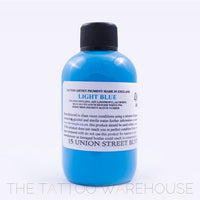 Bottle of Dermaglo Light Blue tattoo ink