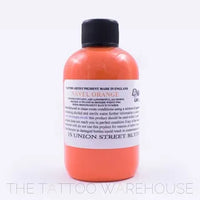 Bottle of Dermaglo Navel Orange tattoo ink